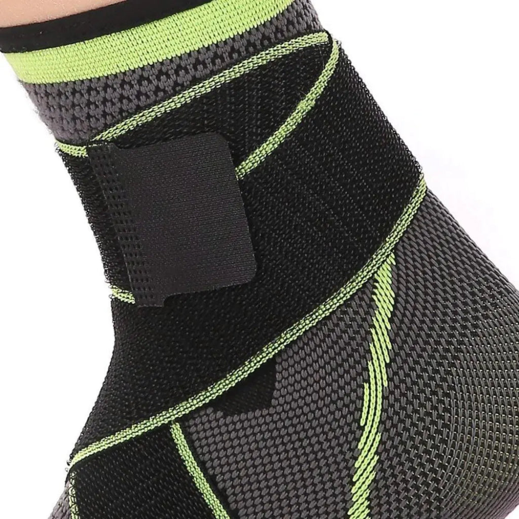 Black and green ankle support brace on a white background